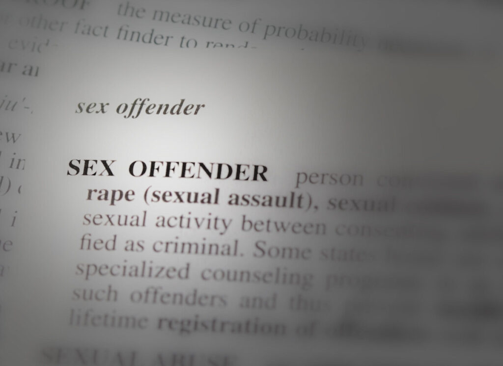 close up photo of the word sex offender